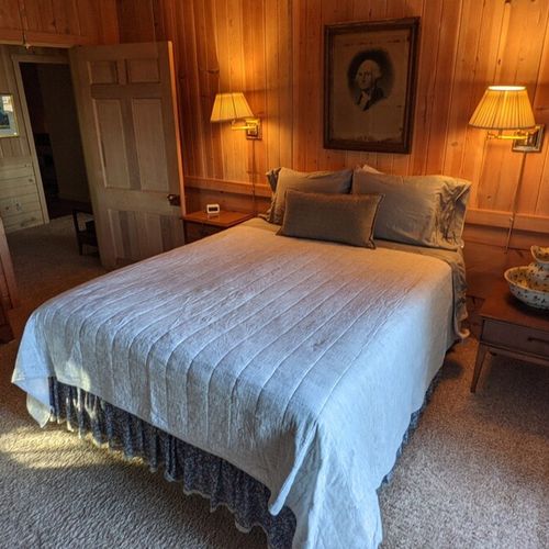 Bedroom #2 (first floor):  bedroom #2 is a lovely bedroom on the east side of the home. It features a queen-size bed, lakeview, and private entrance.