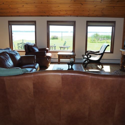 Living room:  the cabin has a huge living room with a gas fireplace and 
 great lake views!