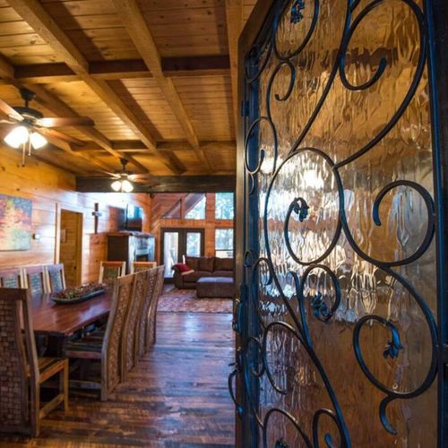 As you enter, you are greeted by an open concept living room and dining area.