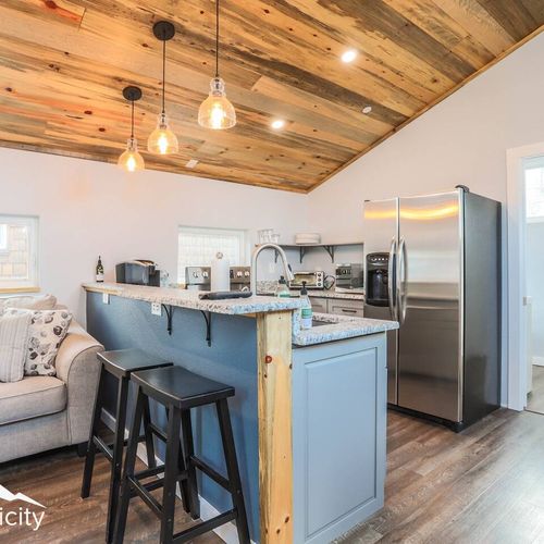 The kitchen is bright and open.