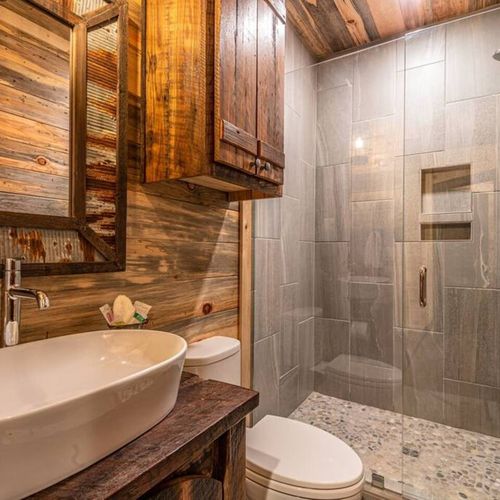 Full bathroom with a walk-in shower.