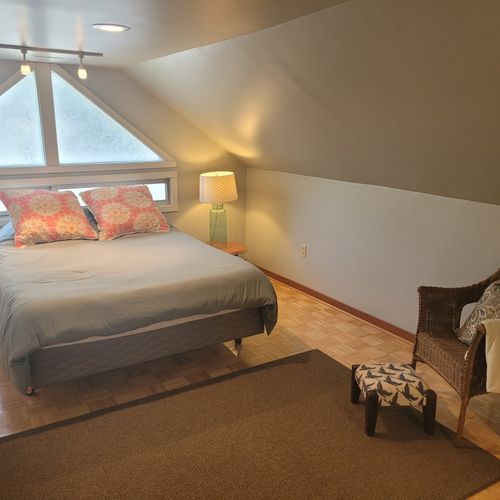 Bedroom #2 ( second floor):  very cute and fun bedroom with a queen-size bed, chair, lots of closet space and its own en suite full bathroom.