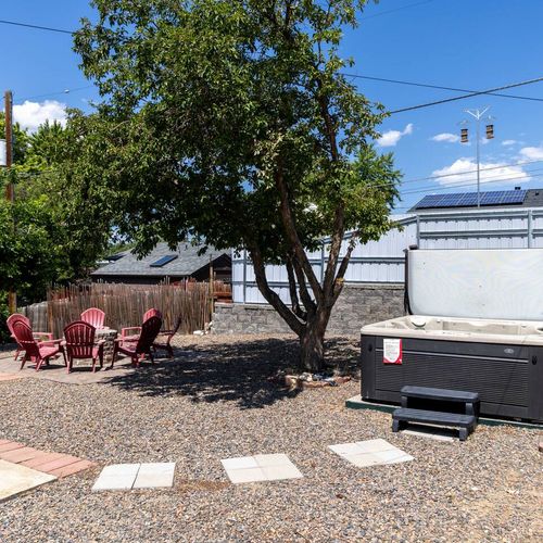 Find shade, sun, or stars—this home’s outdoor hangouts have it all.