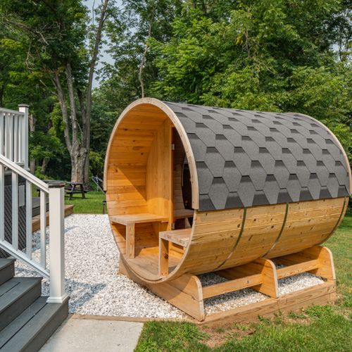 This backyard barrel sauna is a perfect place to unwind.