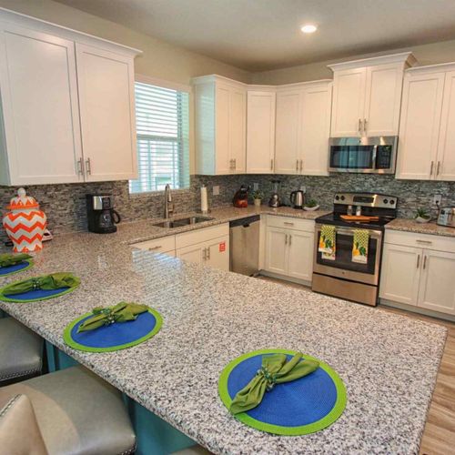 Modern Kitchen w/Stainless Steel Appliances & Granite Counter Tops