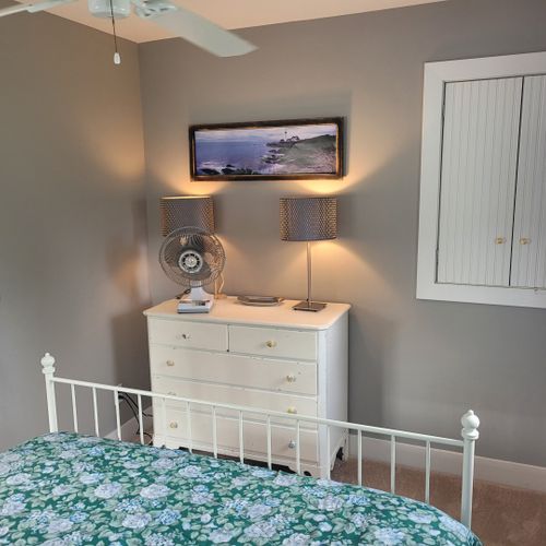 Bedroom #3 (larger house, second floor):  features a queen-size bed, dresser, closet, and great views of lake huron!