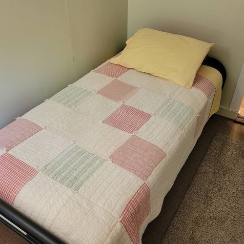 BEDROOM #2:  Features 2 twin-size beds.  (Note that there is no door to the bedroom.  There is only a curtain.)