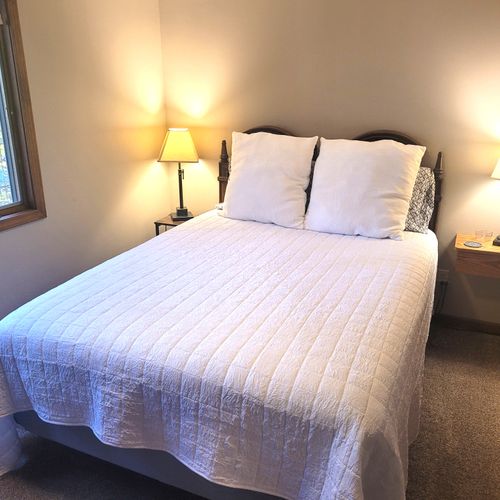 BEDROOM #3 (SECOND FLOOR):  Comfy bed with a queen-size bed, nightstand, ceiling fan, dresser, and closet.