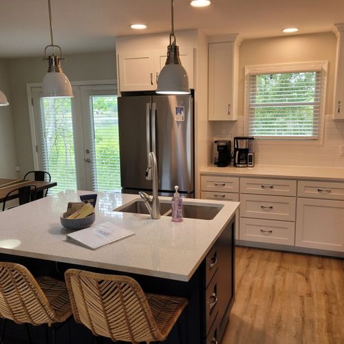 Kitchen:  there is a full kitchen with all-new stainless steel appliances (including a dishwasher), a good supply of cooking and dining utensils, and lots of cupboard and counter space.