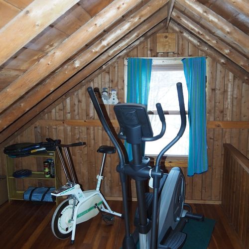 Loft area:  there is a large upstairs loft with a full-size bed, a twin bed, and some older exercise equipment that is available for guests to use.