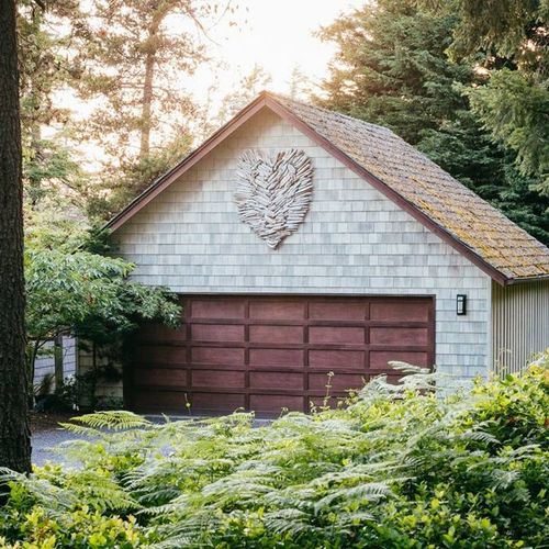 Outdoor Parking Area and Laundry. The washer and dryer are available for guest use. They are located in a private room in the garage building.