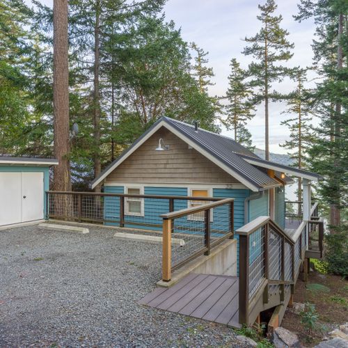 Parking for two cars with an enclosed shed for recycling and waste