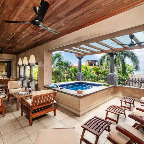 Relax in your private balcony Jacuzzi with breathtaking ocean views in this luxurious Langosta Beach penthouse, perfect for a romantic getaway or a family vacation in Tamarindo.