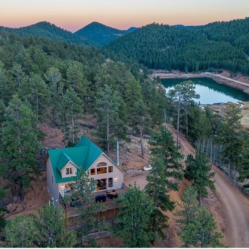 Soak in views of mount evans, mount royal, and rosalie peak with your favorite drink from one of two outdoor patios.