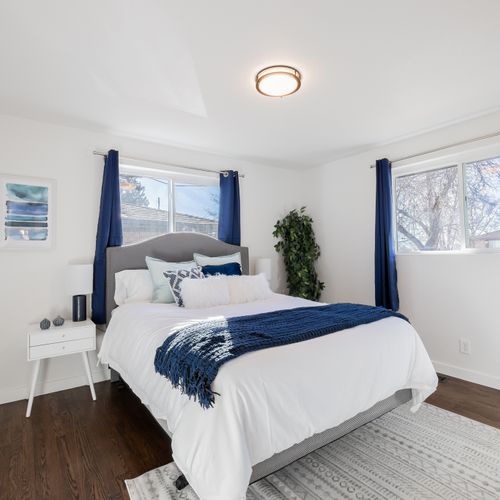 The sunlit and airy master bedroom includes an en suite bathroom for your convenience.