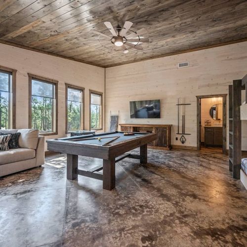Pool table and oversized sectional.