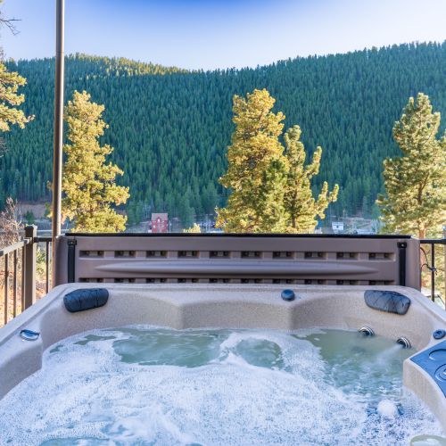 Enjoy the quiet seating on the patio or soak in the hot tub with a nice beverage. Nothing beats a hot tub with a captivating view!