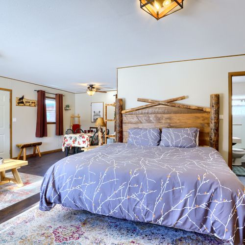 The bedroom area leads into the bathroom.