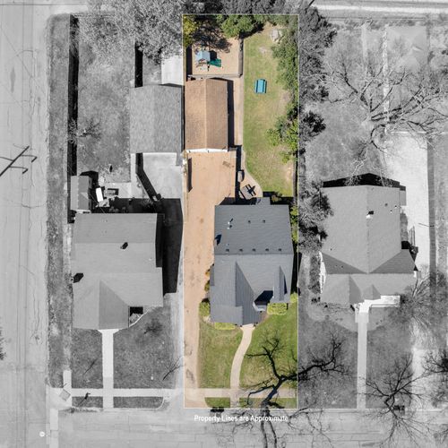 Aerial View of Property with Parking
