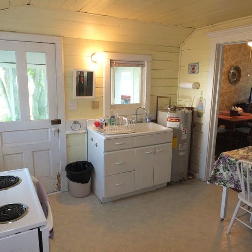 Kitchen:  the cottage has a cute old kitchen with all appliances except for a dishwasher.