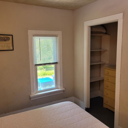 BEDROOM #2 (SECOND FLOOR):  Features a queen-size bed, nightstands, lakeview, and closet.