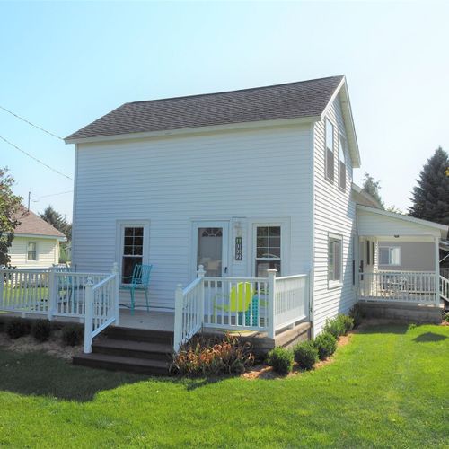 Exterior:  the side porch in summer.