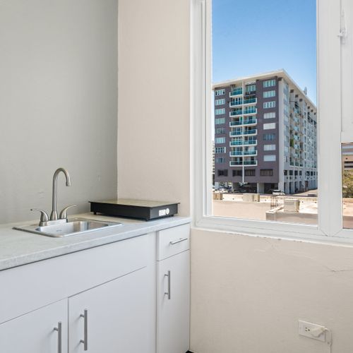 Everything you need for a quick meal: sink, counter space, and essentials.