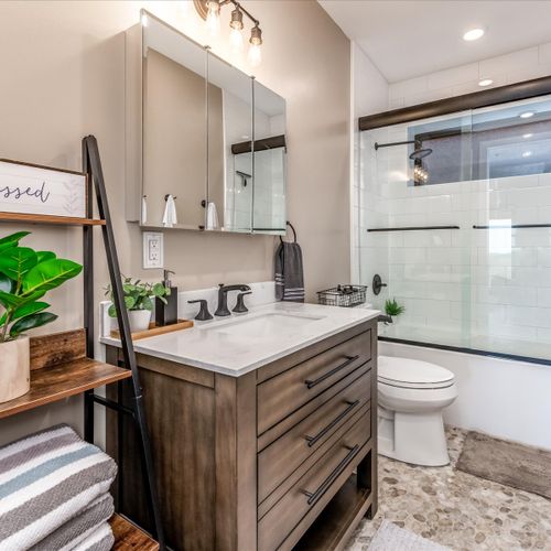 Finishing the lower level is a full bathroom with tub, complete with all the soap essentials.