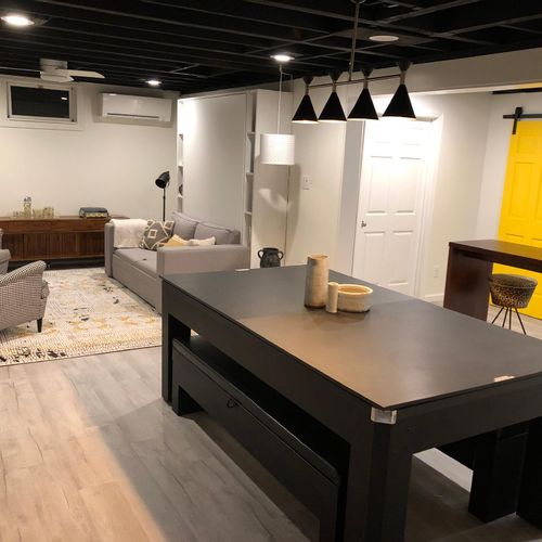 Newly renovated downstairs has a pool table that also doubles as a ping pong table.