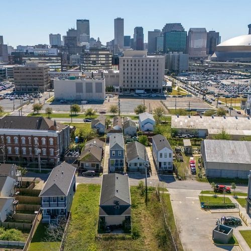 Aerial view of the surrounding area & city streets.