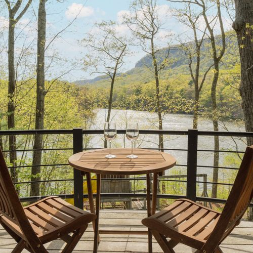 Enjoy lake views from your own private balcony off the primary bedroom.