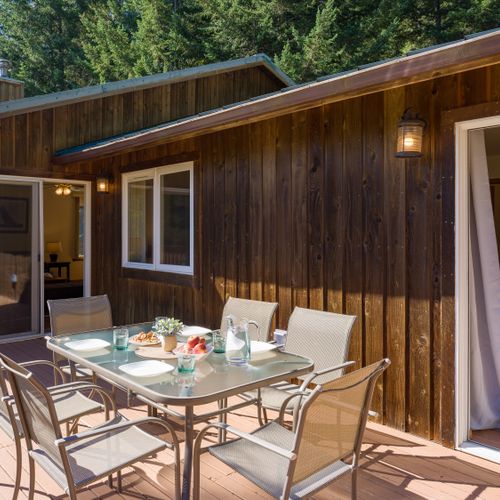 Sliding glass doors off the main bedroom opens to the deck for morning coffee.