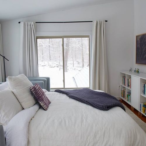 Winter photos of the library area with pull-out Queen bed.