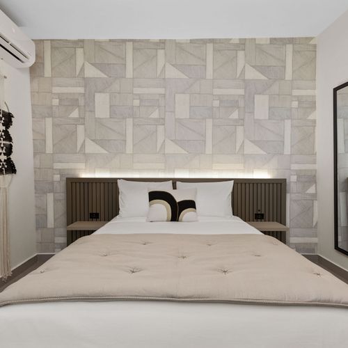 Relax in comfort with our bright, airy bedroom.