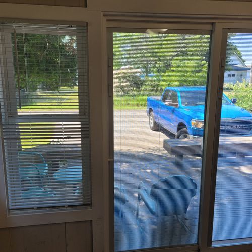 SUN PORCH:  The home has a fully enclosed sun porch with a nice view of Crystal Lake!