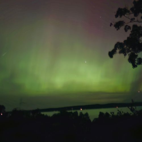 Exterior:  a view of the northern lights from the house
