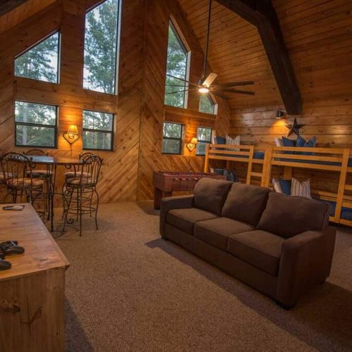 Upstairs you will find the loft with a queen sleeper sofa and 4 twin beds!