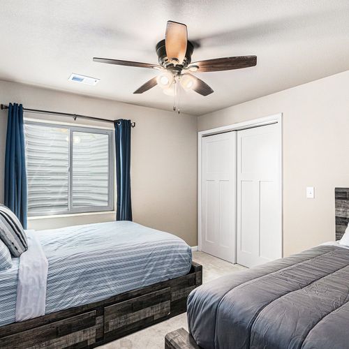 Comfortably designed with a double and single bed, this room ensures plenty of space for guests to relax in style.