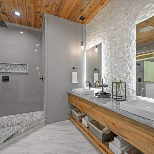 The private bath has a walk-in rain shower as well as double vanity!