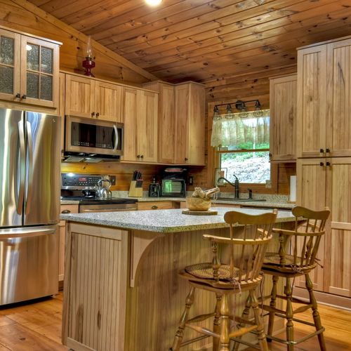 Craft culinary memories in our fully-equipped cabin kitchen.