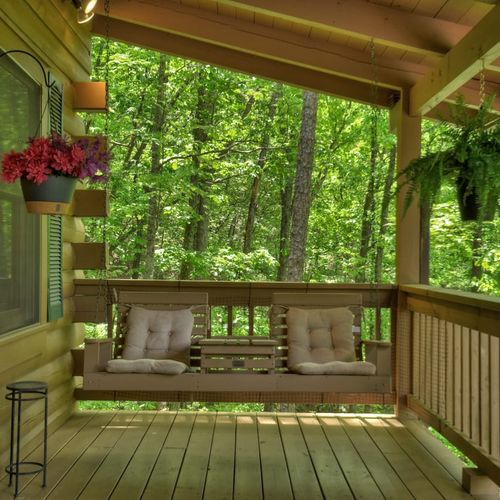 Relax with a warm cup of coffee while taking in the serene surroundings, whether on the porch or in one of the many cozy seating spots scattered throughout the property.