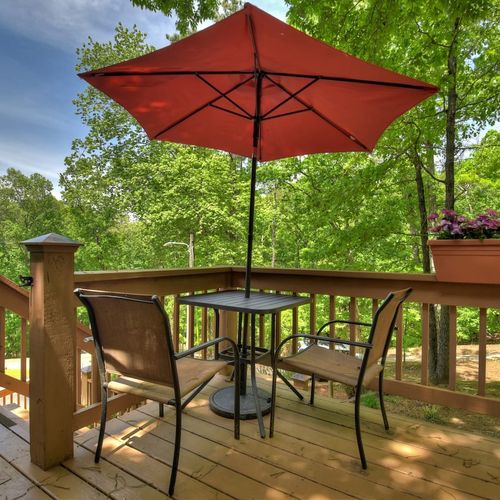 Relax with a warm cup of coffee while taking in the serene surroundings, whether on the porch or in one of the many cozy seating spots scattered throughout the property.