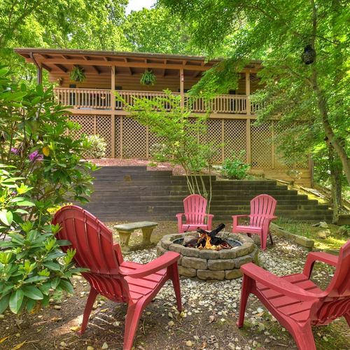 Gather around the crackling fire pit and let the warmth of the flames set the perfect mood for a relaxing evening.