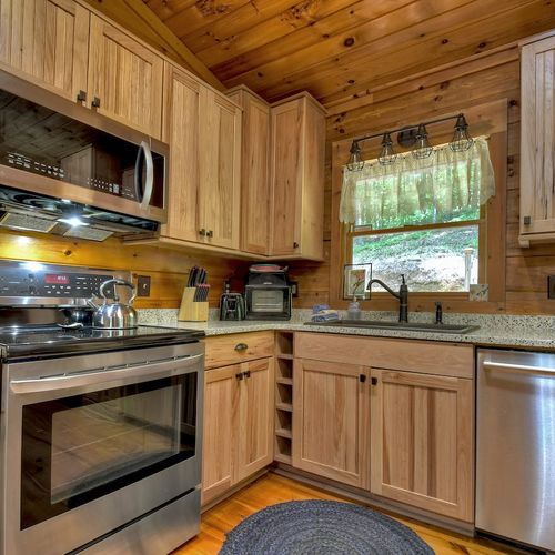Craft culinary memories in our fully-equipped cabin kitchen.