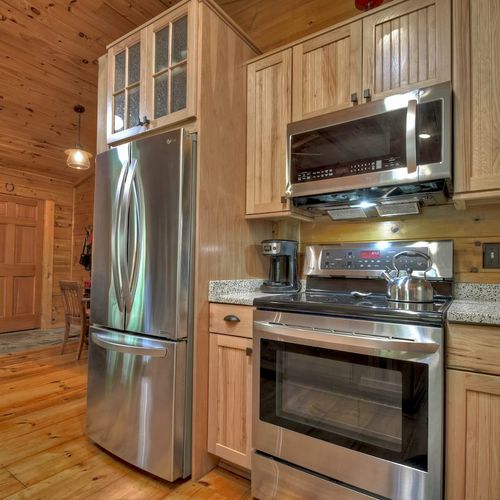 Craft culinary memories in our fully-equipped cabin kitchen.