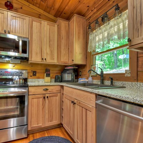 Craft culinary memories in our fully-equipped cabin kitchen.