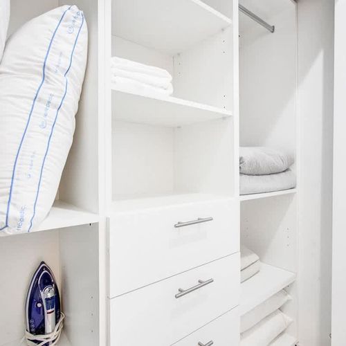 Generous closet space stocked with extra linens and pillows for your convenience.