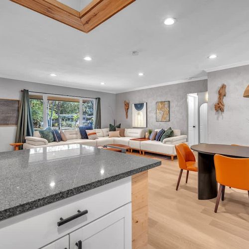 Charming and open living area, complete with relaxed seating options.