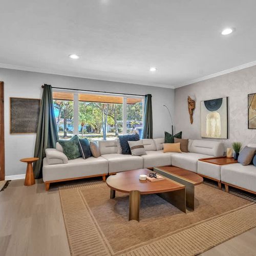 Eclectic and spacious living space with comfy seating spaces.