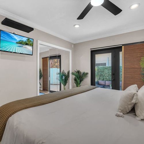 Enjoy spacious bedrooms with plush king-sized beds, soft, clean linens, and a TV for your relaxation.